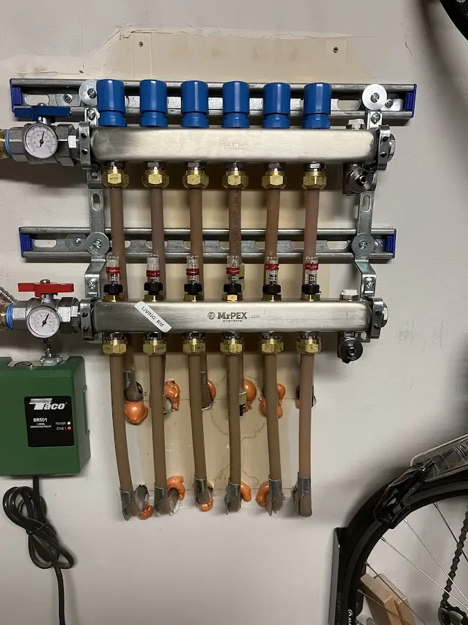 Plumber performing Water Heater Repair at a residential property in Boise City